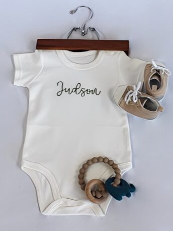 White bodysuit with hand embroidery